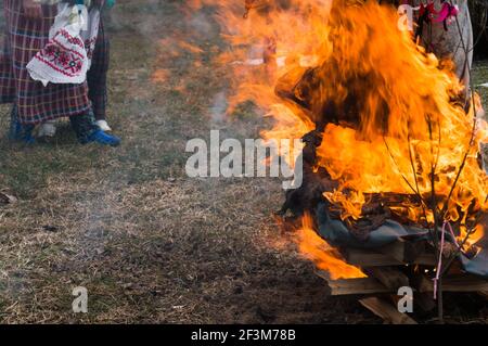 Commune, BELARUS-March 14, 2021: ancient Slavic tradition of burning an effigy of winter, Maslenitsa Stock Photo