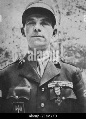 World War II period from German propaganda news. France. 1943 Commander Curnier, already holder of the Croix de Guerre with palm. Head of the French m Stock Photo