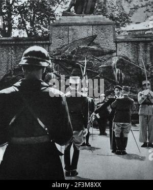 World War II period from German propaganda news. Marshal Petain awards French fighters of Tunisia and the Eastern Front by Croix de Guerre. 1943 Stock Photo