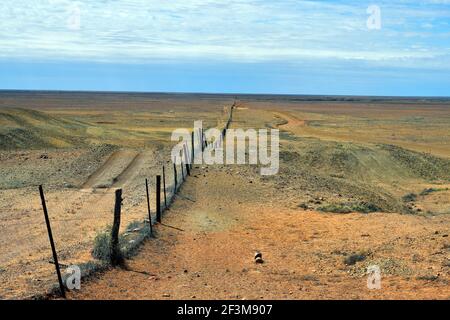 Australia, dog fence aka dingo fence, 5300 km long fence to protect pastures for sheeps and cattles Stock Photo