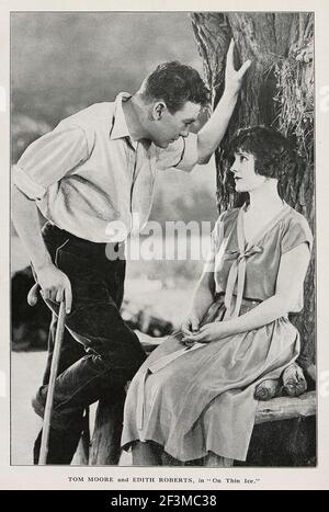 Tom Moore and Edith Roberts, in 'On Thin Ice.' 1925 Thomas J. 'Tom' Moore (1883 – 1955) was an Irish-American actor and director. He appeared in at le Stock Photo