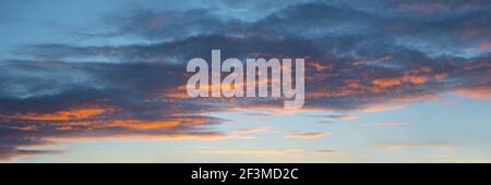 Colorful sky with clouds at sunset, panoramic nature background and web banner Stock Photo