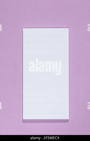 empty note isolated on purple background. space for text, mock up template Stock Photo