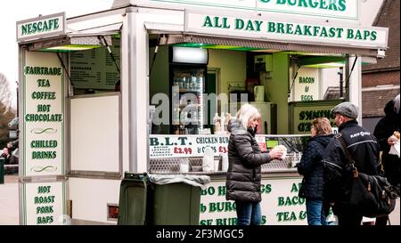 London UK, March 17 2021, People Waiting Outside A Mobile Market Trader Pop-up Food Stall Stock Photo