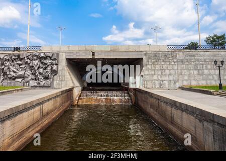 Plotinka weir on river Iset in Yekaterinburg, Russia. The Iset River in Western Siberia flows from the Urals through the Sverdlovsk, Kurgan and Tyumen Stock Photo