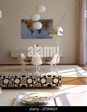 White table and chairs in spacious dining room, Brazil Stock Photo