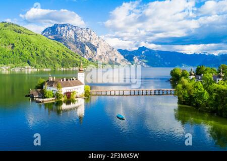 Gmunden Schloss Ort or Schloss Orth on the Traunsee lake aerial panoramic view, Austria. Gmunden Schloss Ort is an Austrian castle founded around 1080 Stock Photo