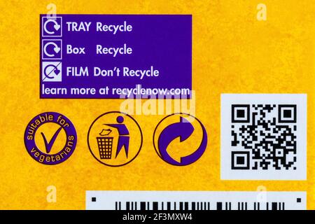 Recycling information and suitable for vegetarians symbol on box of Cadbury Mini Eggs Nest Cakes - disposal recycling recycle logo symbol Stock Photo
