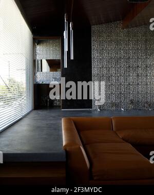 Sunken seating in living room in USA home Stock Photo