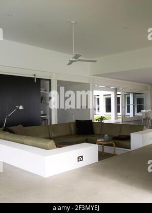 Sunken seating in living room in Australian home Stock Photo