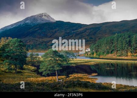 Sgurr na Lapaich and Affric Lodge in Glen Affric late Autumn, Scotland Stock Photo