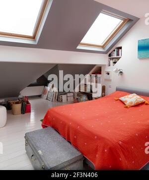 Attic bedroom with Velux windows, UK home Stock Photo