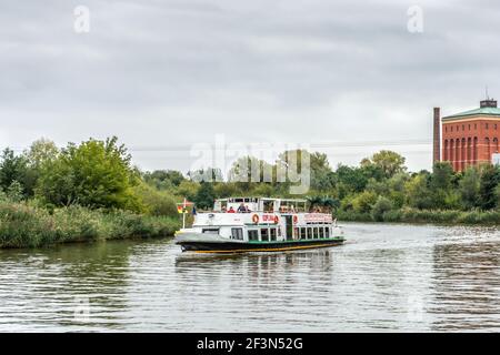 A tourist sightseeing / tourist boat on the Odra river (Oder) at Wroclaw, Silesia, Poland, Europe Stock Photo