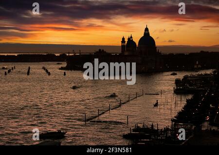 Sunset on the Grand Canal, Santa Maria della Salute, Venice, Italy. Stock Photo