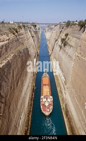 The Corinth Canal is a canal connecting the Gulf of Corinth with the Saronic Gulf in the Aegean Sea. It cuts through the Isthmus of Corinth and separa Stock Photo