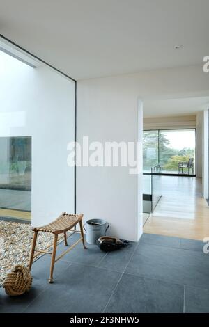 Looking from the glazed entrance hall through to the main living space - Stan Bolt Architect (www.stanboltarchitect.com) Stock Photo