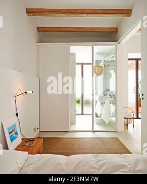 Casa Mariano. A modern residential space, a city apartment with large windows and airy rooms. Stock Photo