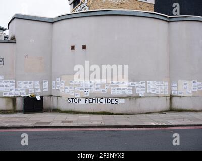 The names of women and their children who have been murdered in the United Kingdom pasted to the side of a building in Clapham, March 14, 2021 Stock Photo