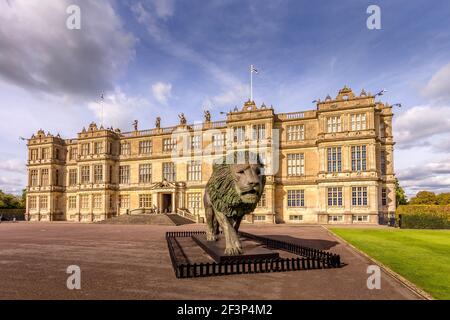 Bronze Lion Sculpture by Bruce Little. Longleat House an English stately home in Wiltshire, England, UK. Home to the Marquess of Bath. Stock Photo