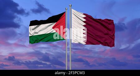 Qatar and Palestine two flags on flagpoles and blue cloudy sky Stock Photo