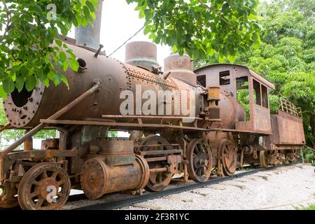 Locomotive and train wagon of the old Madeira Mamoré Railway, known as Devil's Railroad in Rondônia, Brazil in the Amazon Rainforest. History. Stock Photo