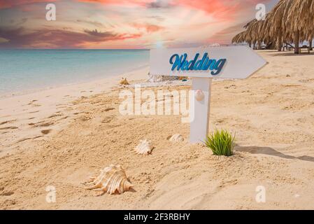 easel with wooden WELCOME TO OUR WEDDING sign in front of dunes Stock Photo  - Alamy