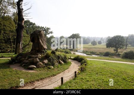 Muskau Park, showing the Puckler Stone and Lusatian Neisse river, looking towards the German side of the park. It is a famous English garden, situated Stock Photo