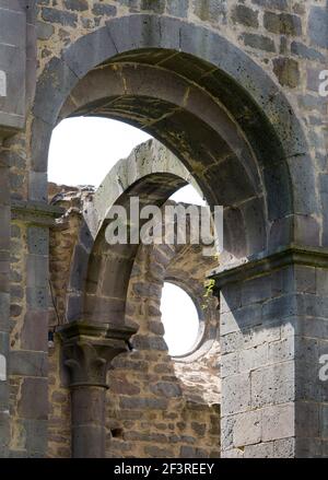 View through arch in ruins of Arnsburg Abbey, Lich, Hesse, Germany Stock Photo