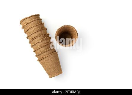 A stack of pots for growing seedlings isolated on a white background. Top view. Stock Photo