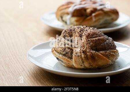 Time for Swedish coffee break with cinnamon bun and cardamon bun Stock Photo