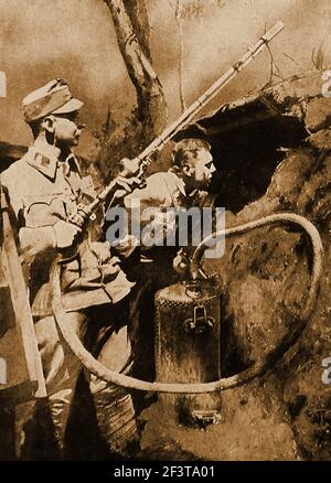 WWI - Trench warfare - Hungarian soldiers on the Isonzo front using a device to spray acid towards the Italian trenches- The Battles of the Isonzo or  the Isonzo Front  ( Soška frontaby ) were a series of 12 battles between the Austro-Hungarian and Italian armies in World War I  in an area now largely present-day Slovenia Stock Photo