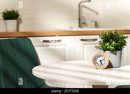 The clock shows five in the morning. Stock Photo