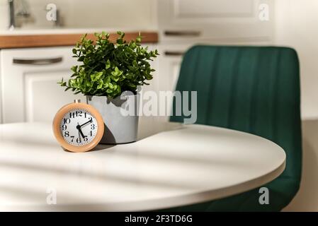 The clock shows five in the morning. Stock Photo