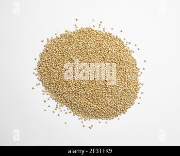 Raw quinoa seeds on a white background Stock Photo