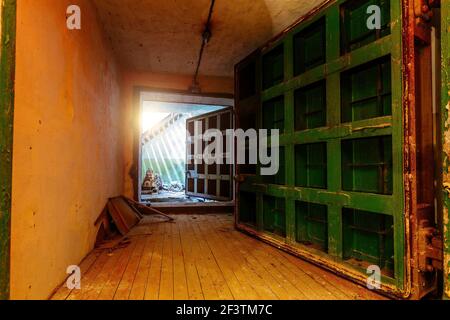 Opened heavy steel armored hermetic door in the Soviet bomb shelter Stock Photo