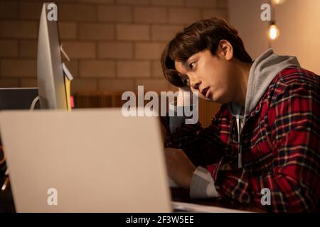 Asian young man working overtime cocenpt Stock Photo