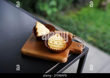 Close up Christmas festive shaped butter cookies on wooden tray table Stock Photo