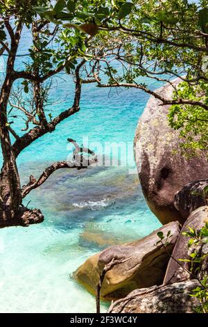 Waves splash the sands of Nudey Beach, Fitzroy Island, in the crystal