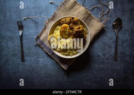 Top view of popular mughlai cuisine biryani in a bowl Stock Photo