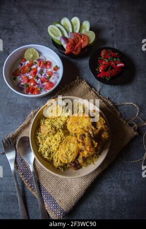 Popular mughlai cuisine biryani in a bowl Stock Photo