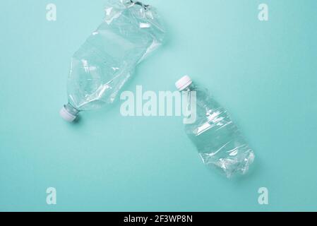 Plastic bottles on blue background. top view. Recycle plastic, waste pollution concept. Top view, copy space. Environmental protection concept. Reuse Stock Photo