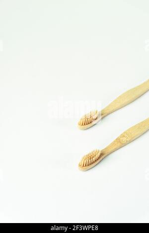 Two toothbrushes on a white background. Personal hygiene and self-care concept. Top view, copy space. Selective focus Stock Photo