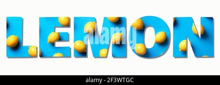 Inscription Lemon made with lemons on blue paper background. Top view. Food pattern. Text for your design. Summer concept. Vegan and vegetarian diet Stock Photo