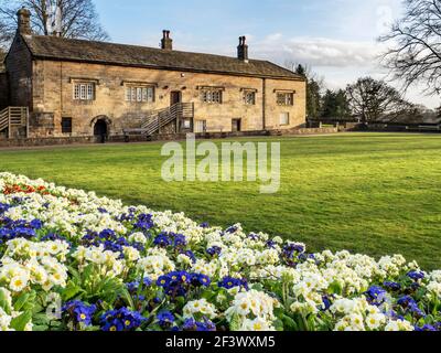 Court House Museum and Spring flowers in the Castle Grounds at Knaresborough North Yorkshire England
