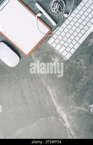 Business composition with white computer keyboard, mouse, clipboard, paper on marble background. Coffee break concept. Top view with copy space for Stock Photo