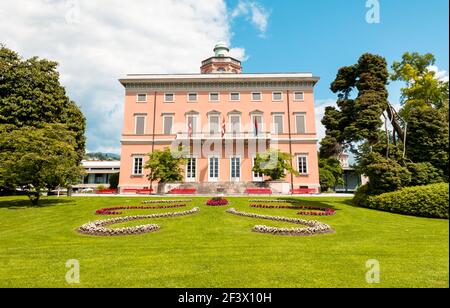 View of Villa Ciani with colorful flowers foreground in the public city park of Lugano, Switzerland Stock Photo