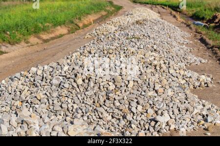 Construction of gravel road in rural areas Stock Photo