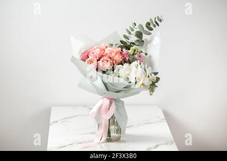 Delicate pink rose bouquet on a white background Stock Photo
