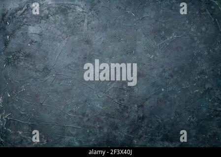 Old black abstract concrete background. Grunge texture. Dark wallpaper. Blackboard. Chalkboard. Top view, copy space Stock Photo