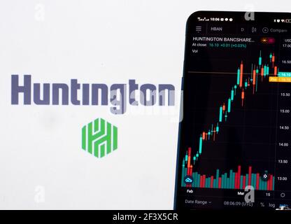 Ukraine. 18th Mar, 2021. In this photo illustration the stock market information of Huntington Bancshares, Inc. seen displayed on a smartphone with the Huntington Bancshares logo in the background. Credit: SOPA Images Limited/Alamy Live News Stock Photo